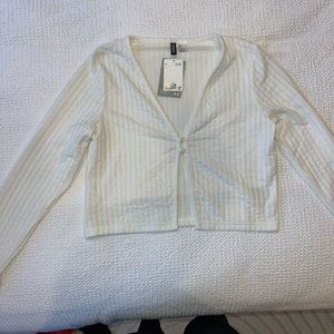 White ribbed, two button, long sleeve